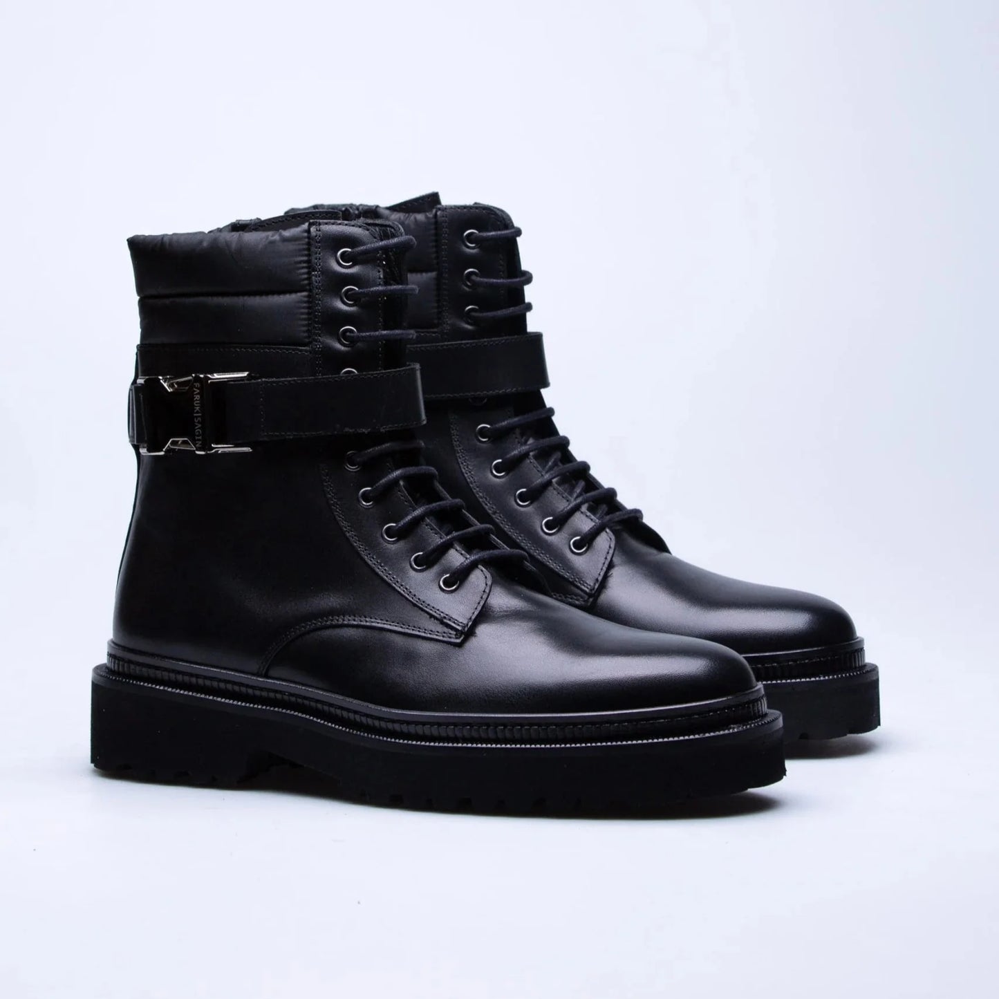 Thick-soled buckled leather light boots